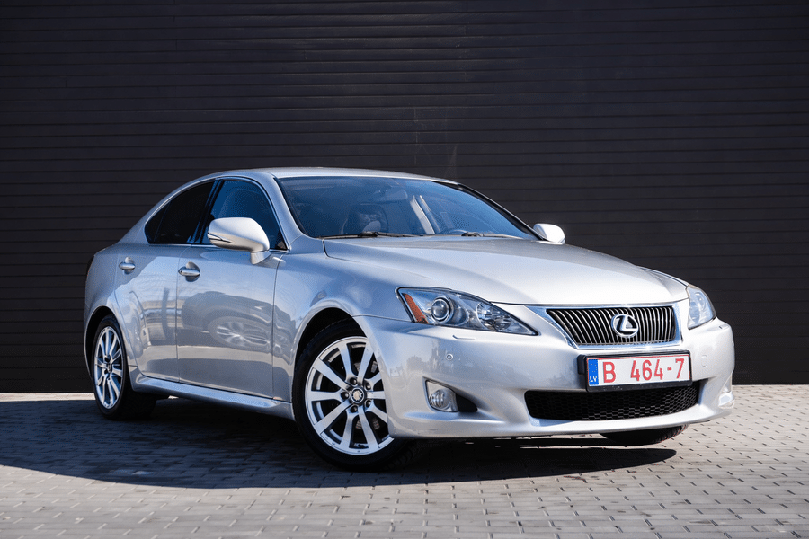 Silver Lexus IS on urban pavement